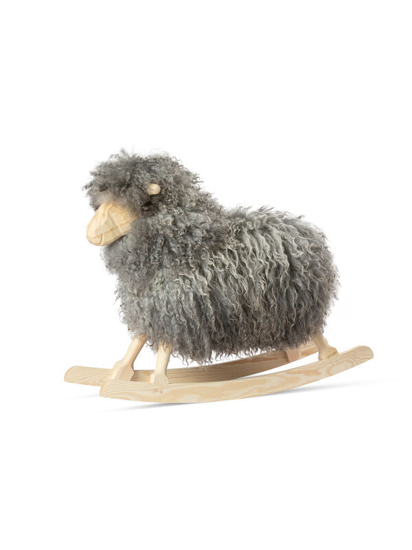 Rocking Sheep made of Pine Wood covered with Gotland Curly Sheepskin. Size: L85xW25xH60 cm
